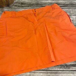 Bright orange skirt